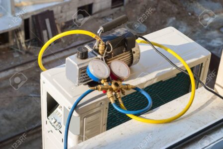 vacuum pump evacuates air from the air conditioner Site Development Contractor Bainbridge Island, WA